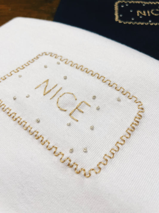 Nice Biscuit - Hand Embroidered Unisex T-Shirt