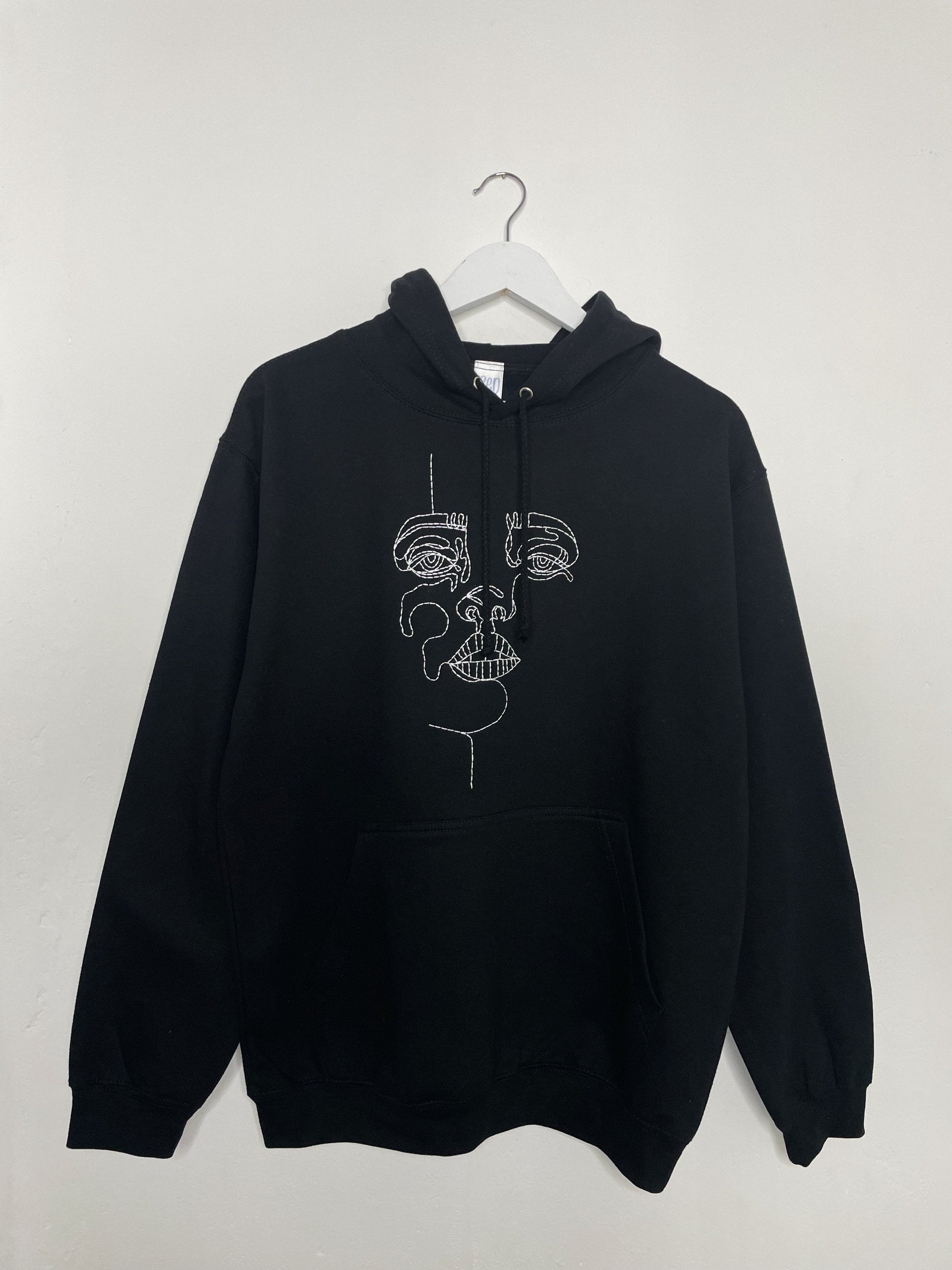 Face hotsell on hoodie